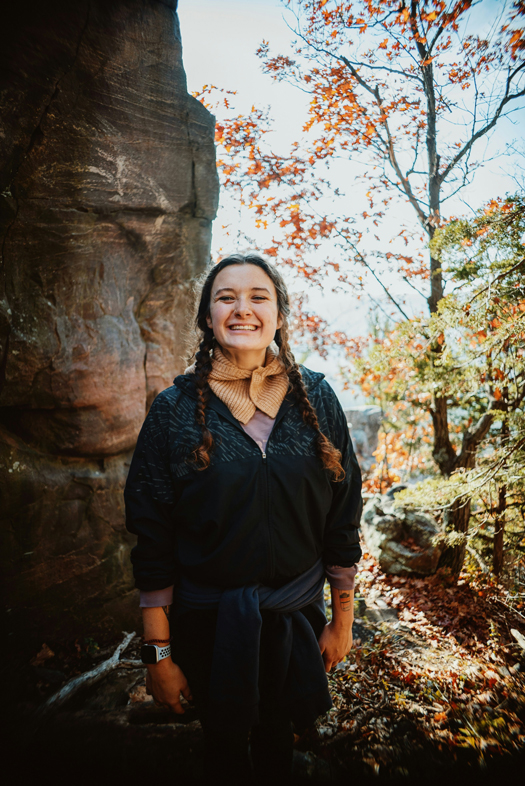 Smiling woman with straight teeth on a hike in Bow, NH